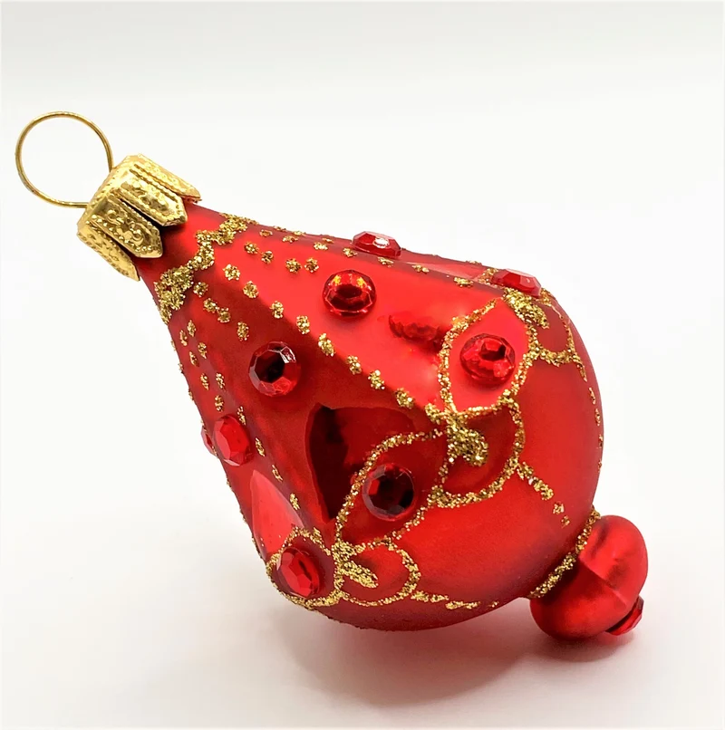 Rotes Lampion-Ornament mit roten Schmucksteinen
