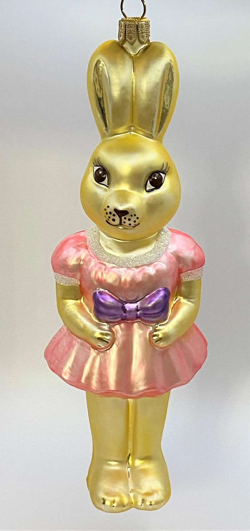 Osterhasen-Mädchen in rosa Kleidchen
