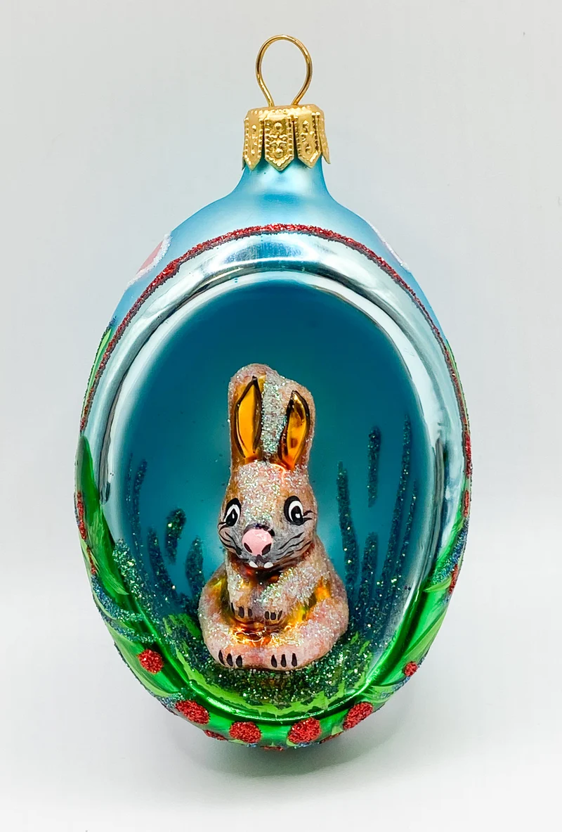 Offenes Osterei blau mit Hase