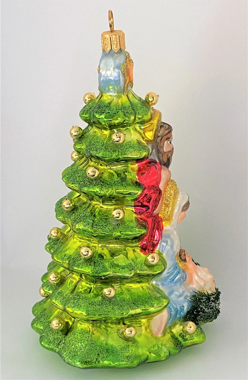 Die Heilige Familie im Schutz des Weihnachtsbaumes