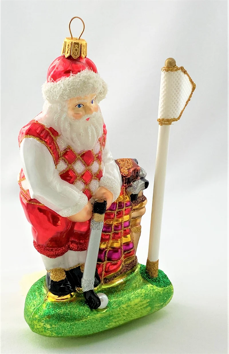 Santa Claus auf dem Golfplatz