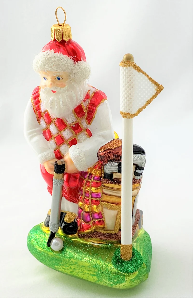 Santa Claus auf dem Golfplatz