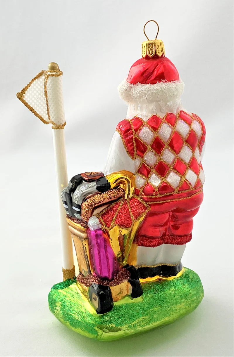 Santa Claus auf dem Golfplatz