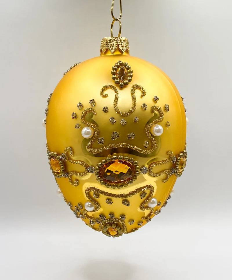 Goldenes Faberge-Ei barock mit Perlen und goldenen Schmucksteinen