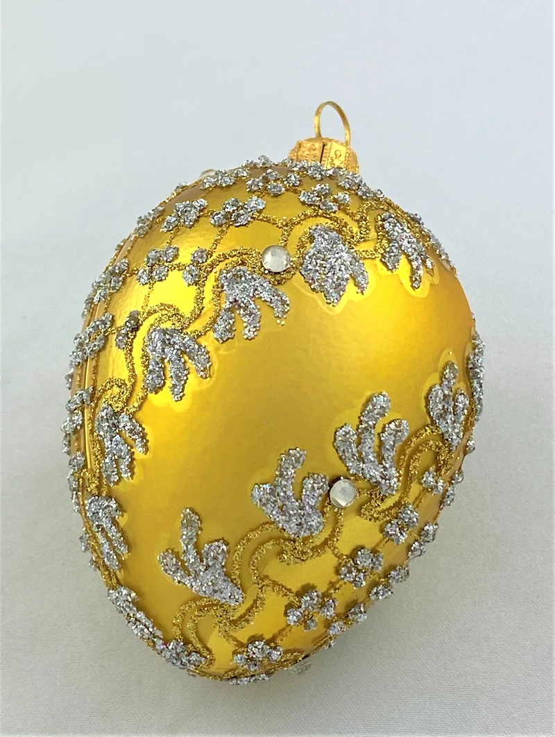 Goldenes Faberge-Ei mit silbernem Barock-Muster