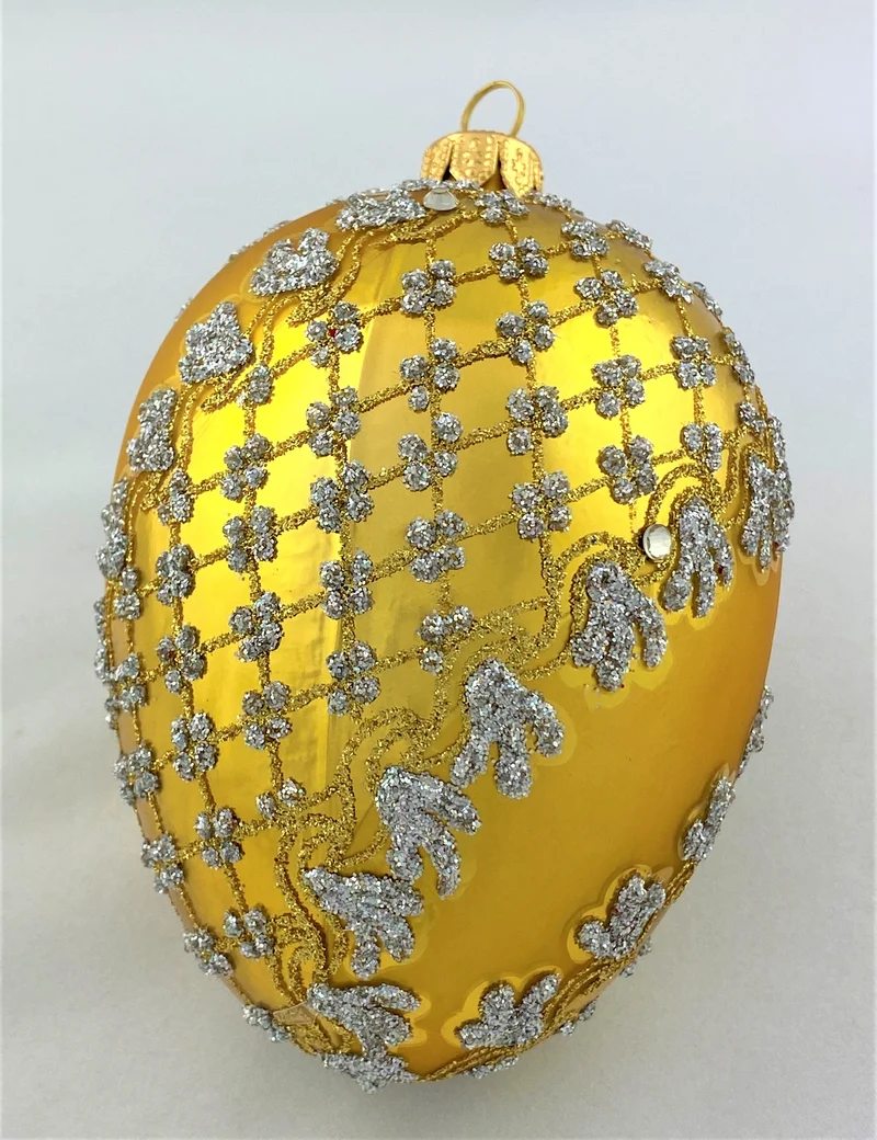 Goldenes Faberge-Ei mit silbernem Barock-Muster
