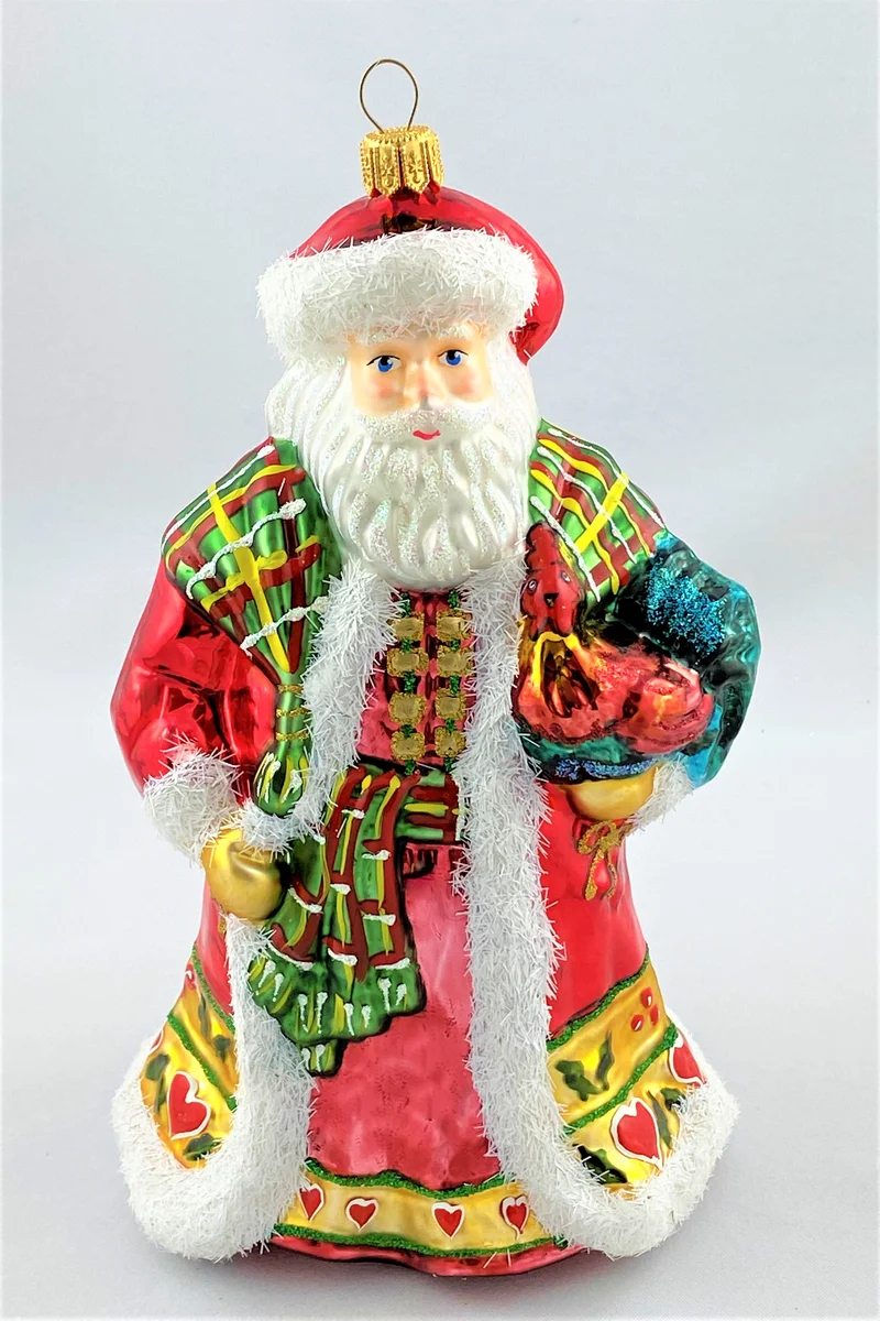 Weihnachtsmann mit Hahn auf dem Arm