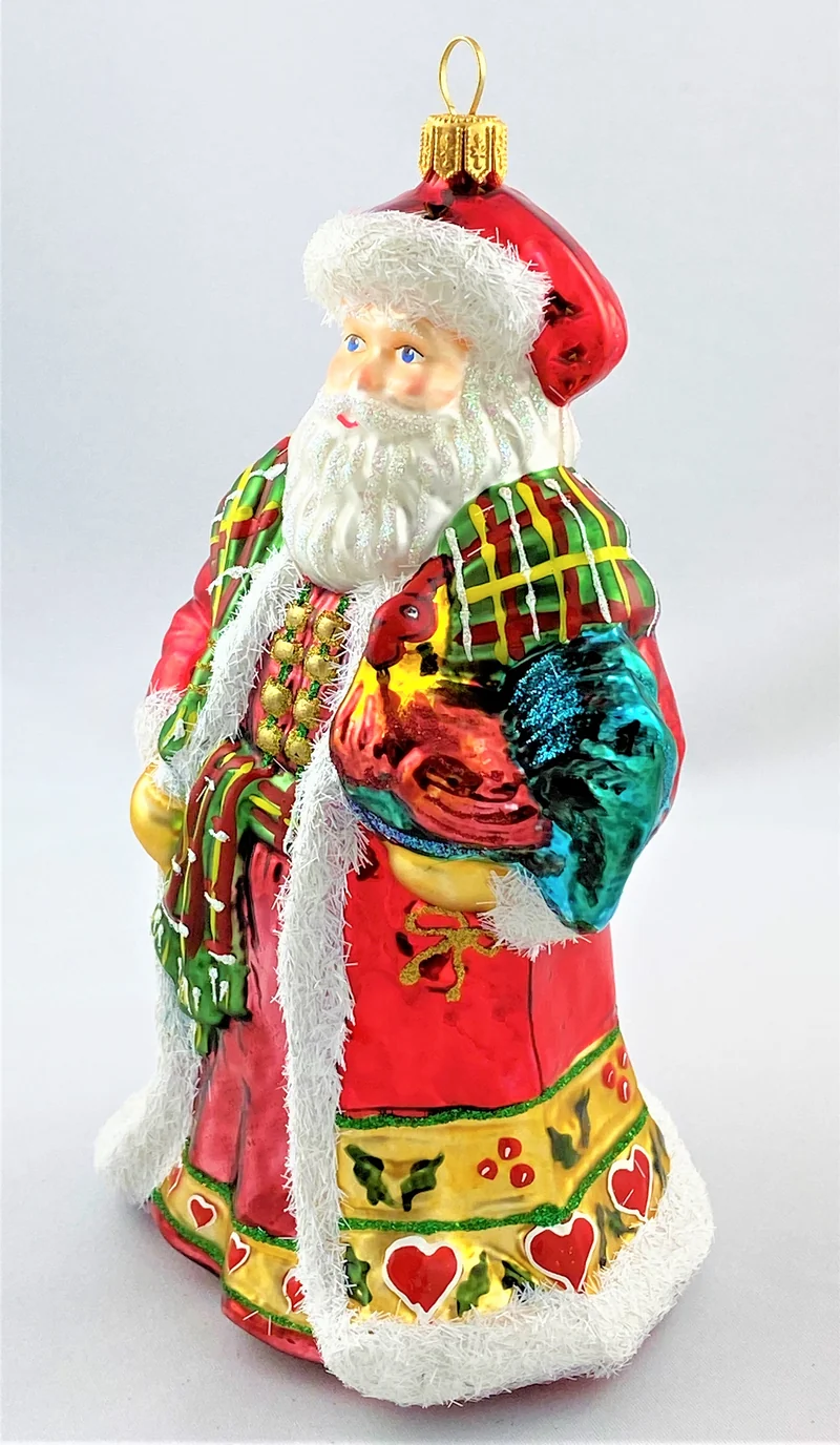 Weihnachtsmann mit Hahn auf dem Arm