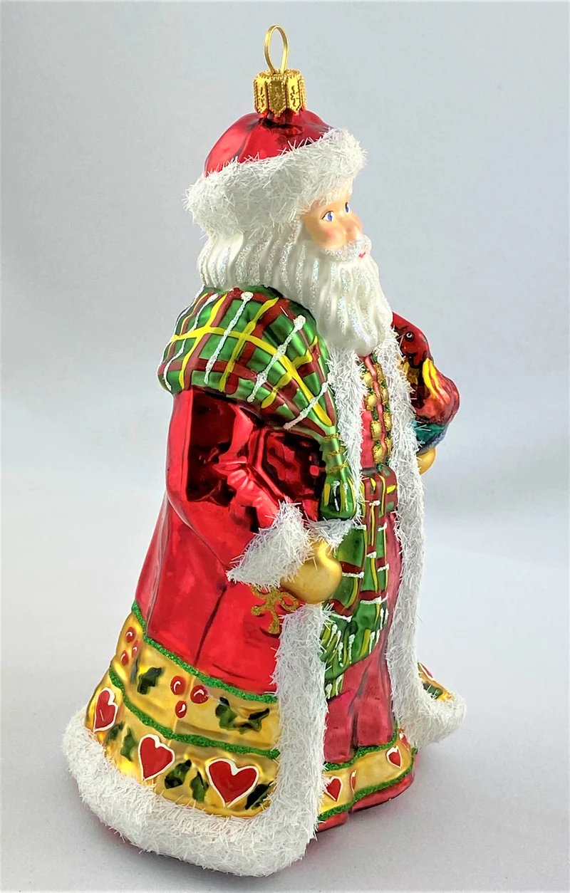 Weihnachtsmann mit Hahn auf dem Arm