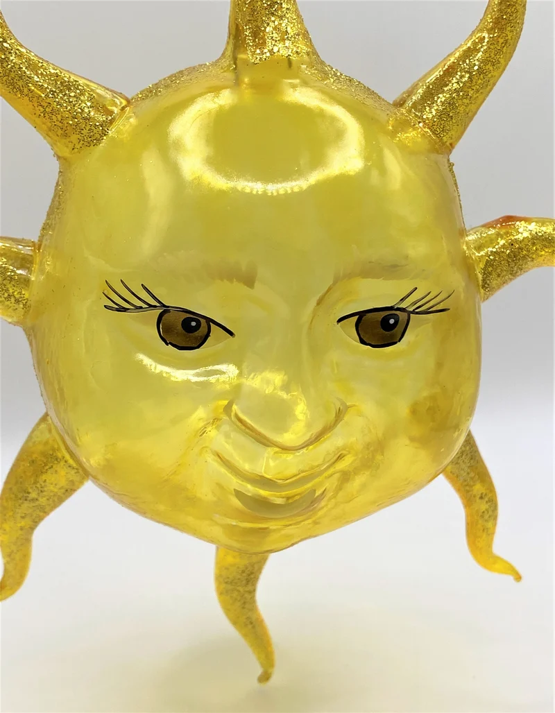 Sonne mit Gesicht
