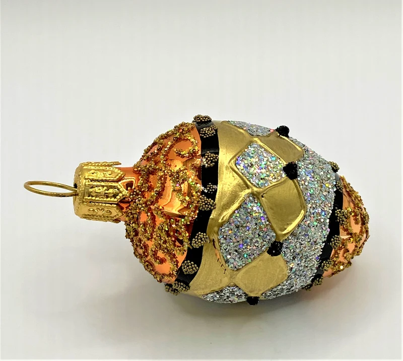 Kleines Ei mit Gold/Silber/Kupfer Dekor