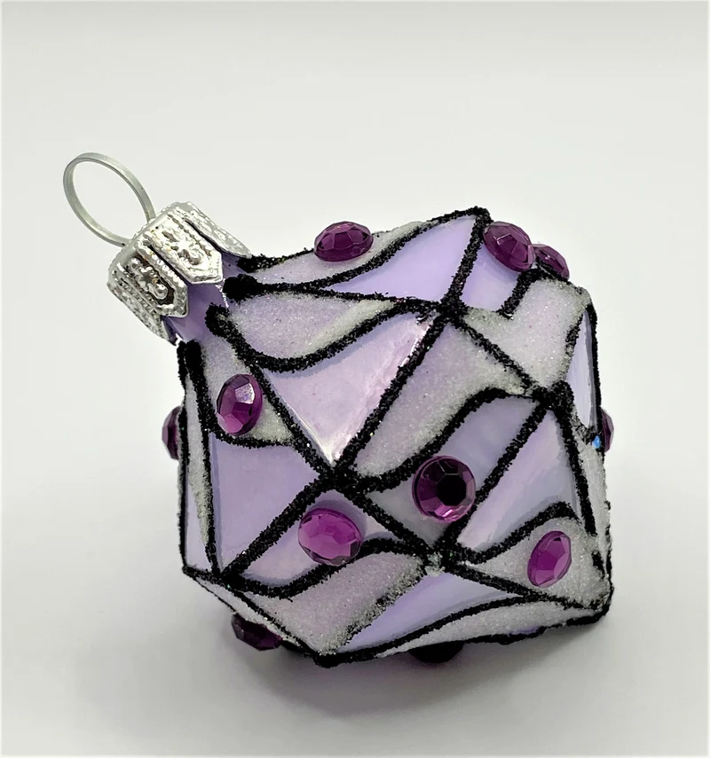 Lilafarbenes Kreisel-Ornament mit violetten Schmucksteinen