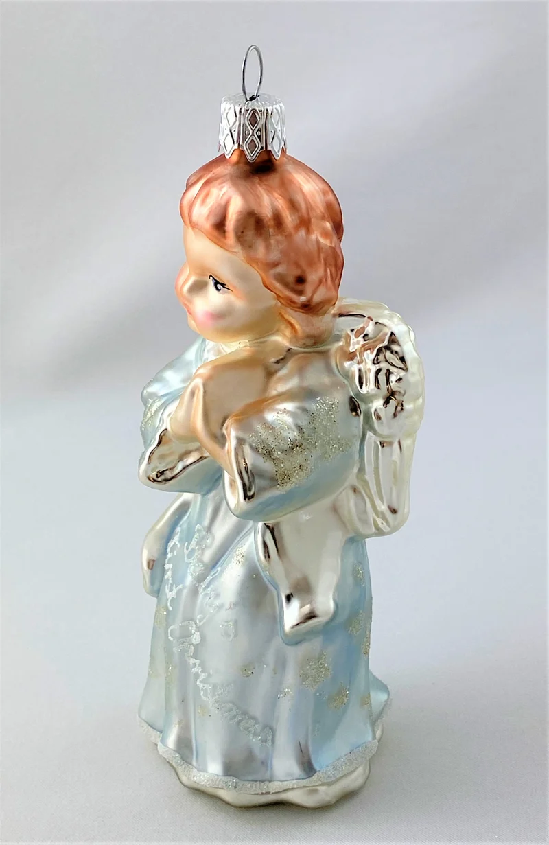 Engel im hellblauen Kleid " Baby`s first Christmas "