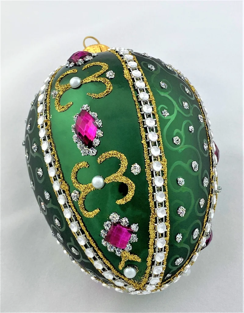 Faberge-Ei dunkelgrün mit weissen und violetten Strass-Steinen