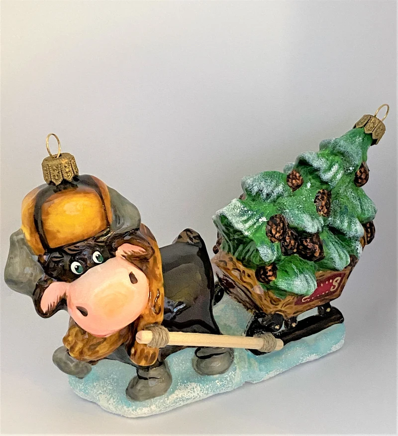 Der Büffel bringt den Christbaum mit dem Schlitten, ATLASART