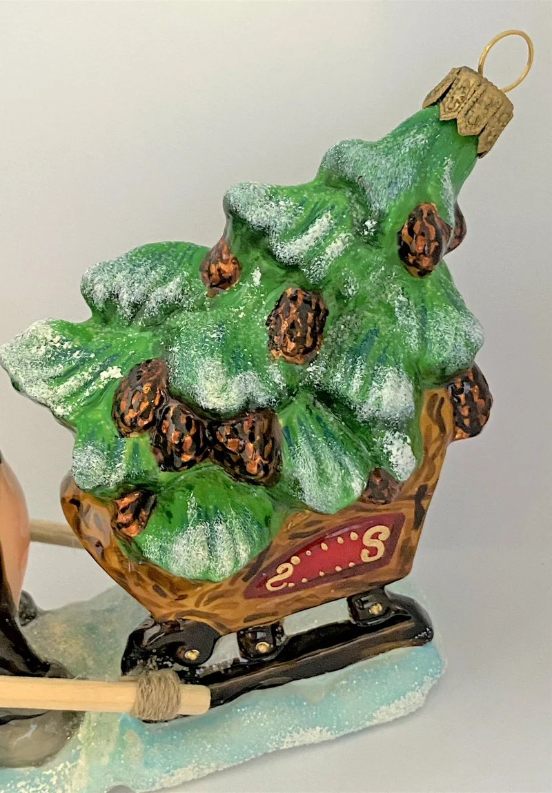 Der Büffel bringt den Christbaum mit dem Schlitten, ATLASART