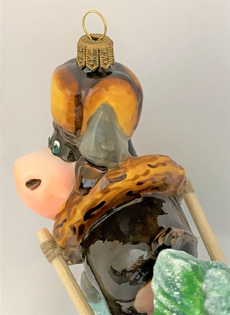Der Büffel bringt den Christbaum mit dem Schlitten, ATLASART