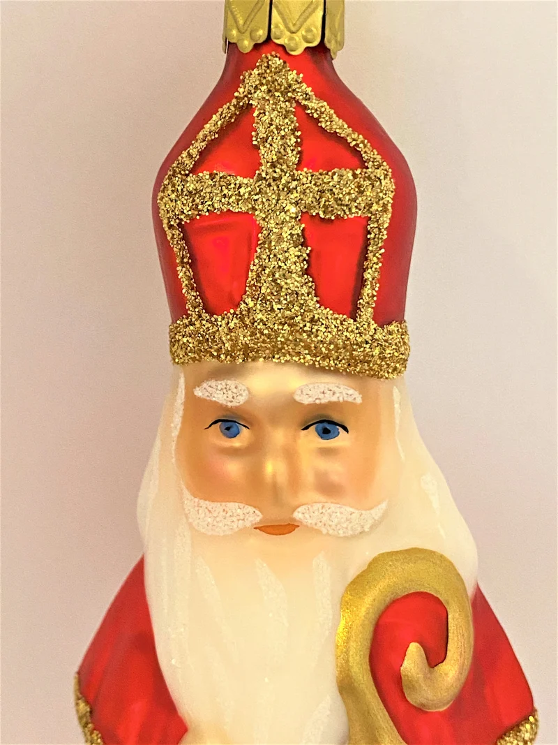 Bischof bringt goldene Äpfel