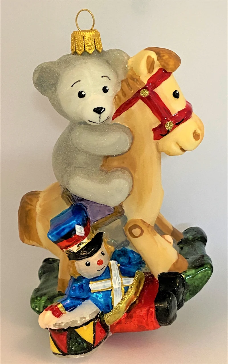Der Teddy-Bär reitet auf dem Schaukelpferdchen, KOMOZJA MOSTOWSKI