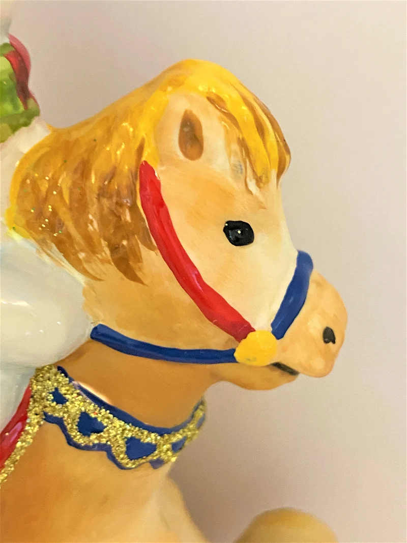 Der Schneemann reitet auf dem Schaukelpferdchen, KOMOZJA MOSTOWSKI