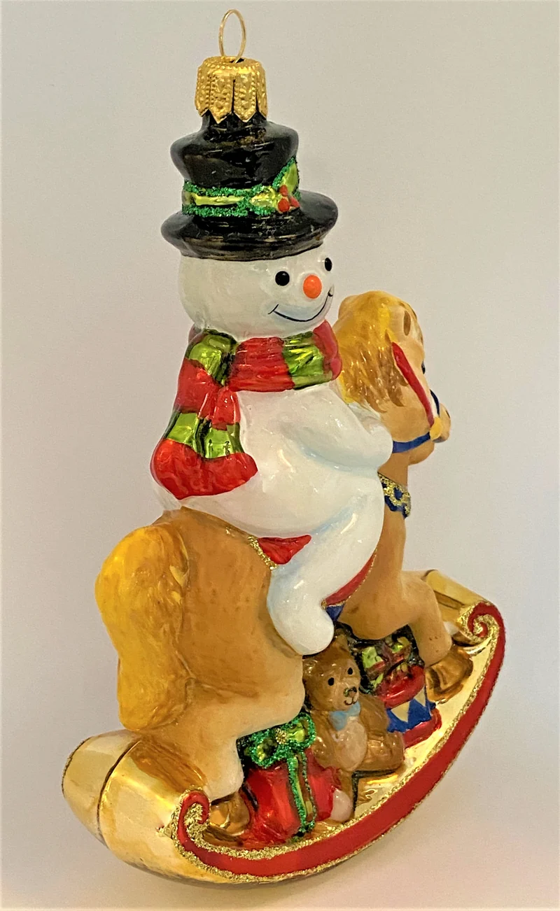 Der Schneemann reitet auf dem Schaukelpferdchen, KOMOZJA MOSTOWSKI