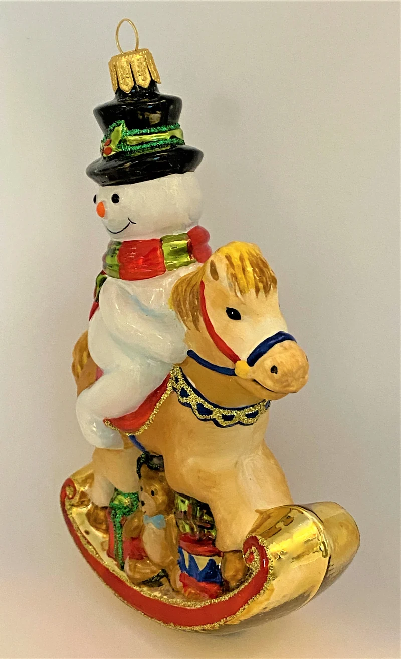 Der Schneemann reitet auf dem Schaukelpferdchen, KOMOZJA MOSTOWSKI