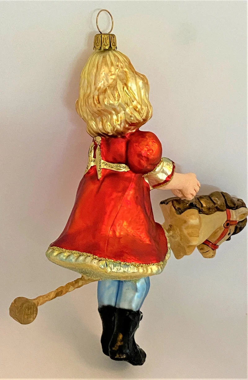 Mädchen mit Stecken-Pferdchen, KOMOZJA MOSTOWSKI