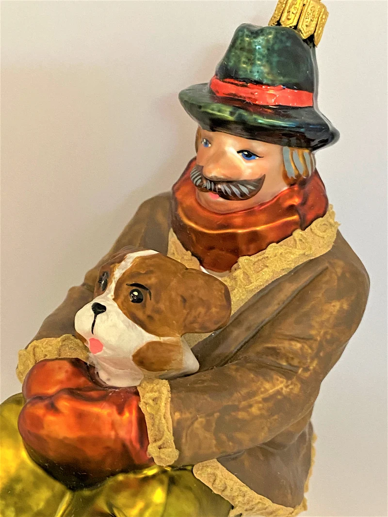 Papa mit dem Hund auf Schlittenfahrt, KOMOZJA MOSTOWSKI