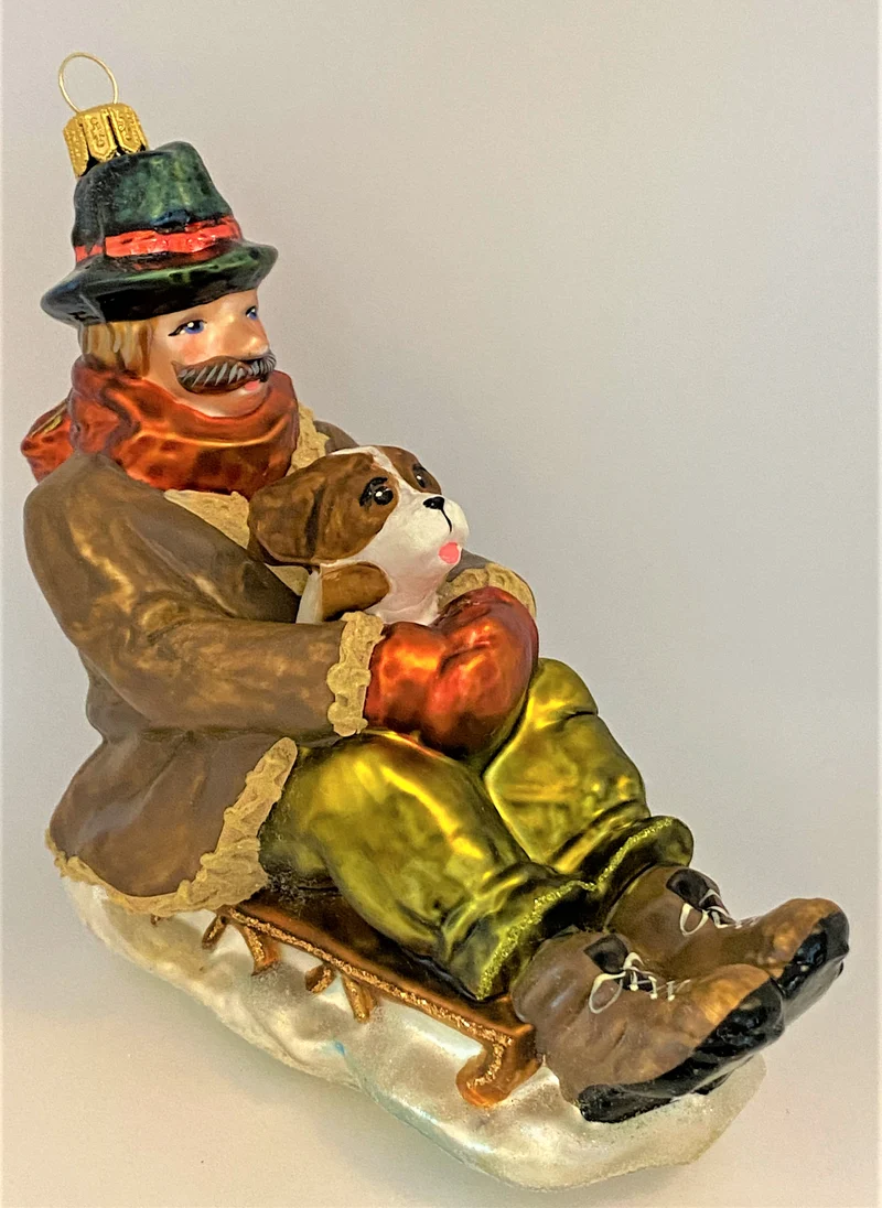 Papa mit dem Hund auf Schlittenfahrt, KOMOZJA MOSTOWSKI
