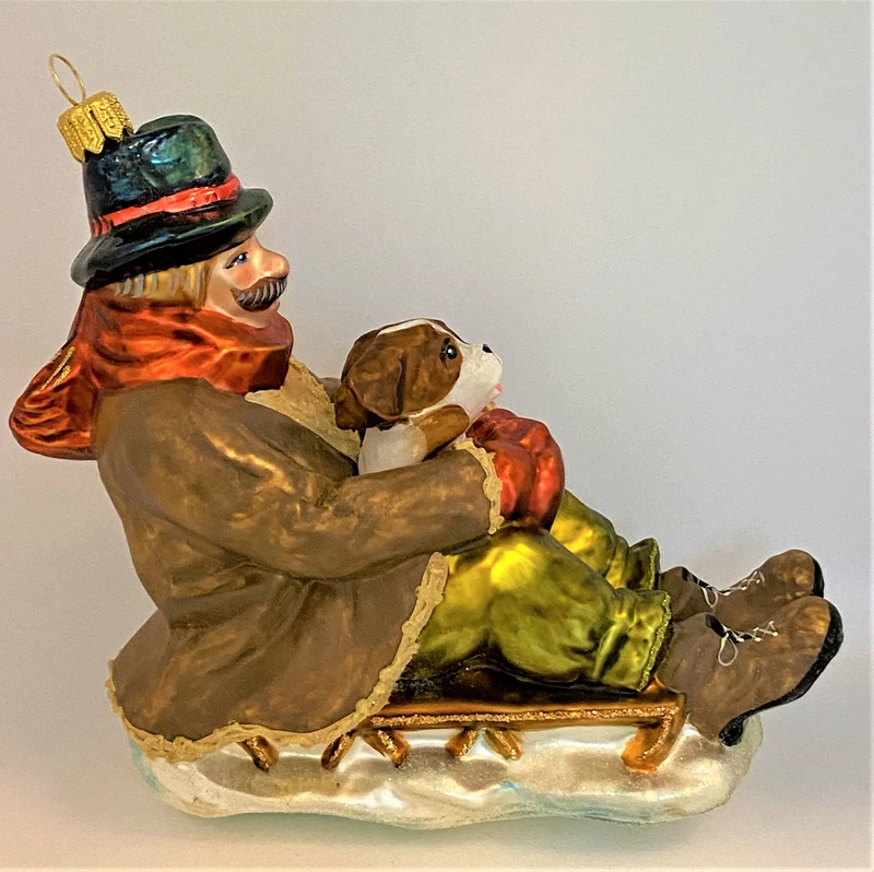 Papa mit dem Hund auf Schlittenfahrt, KOMOZJA MOSTOWSKI