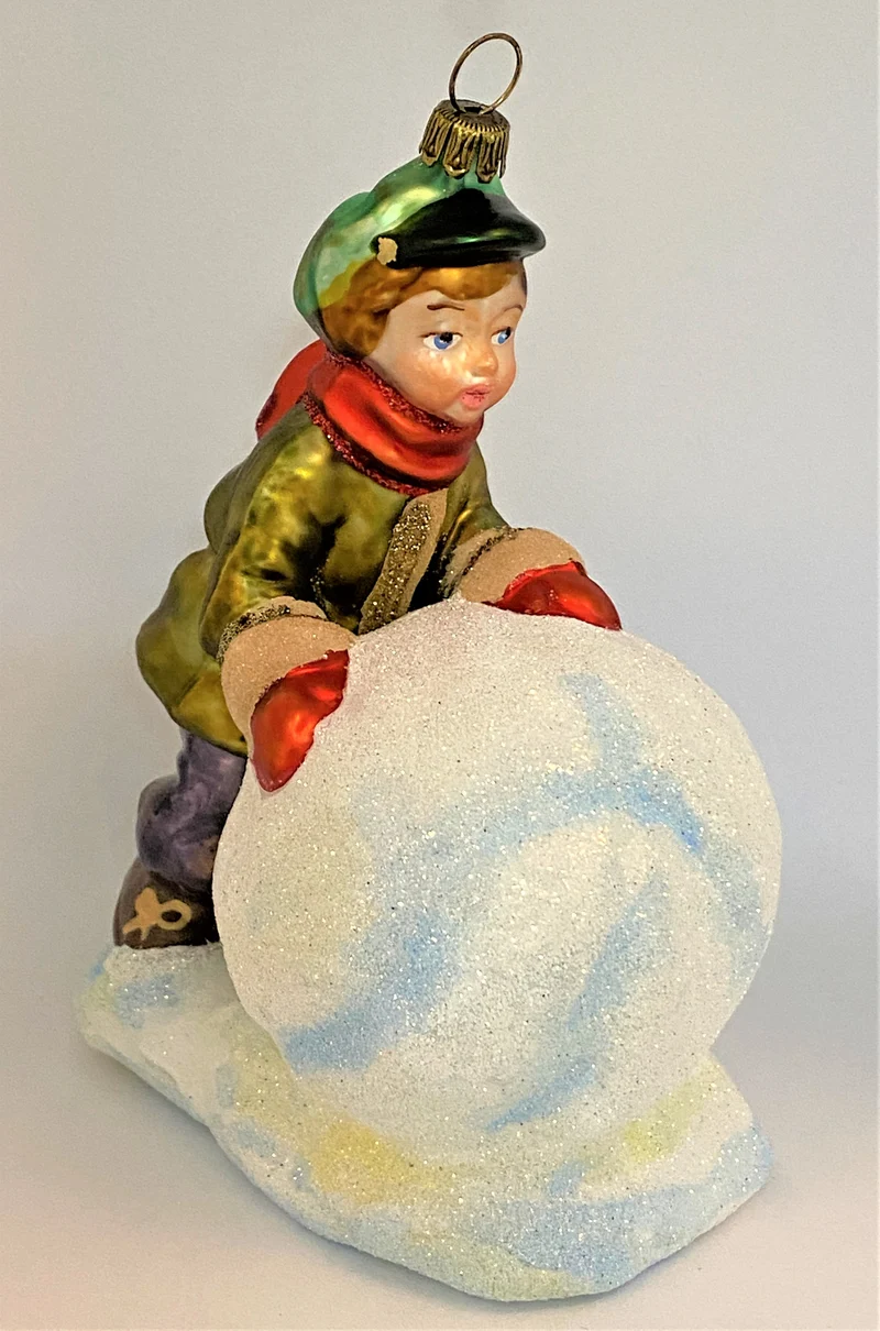 Der Junge will einen grossen Schneemann bauen , KOMOZJA MOSTOWSKI