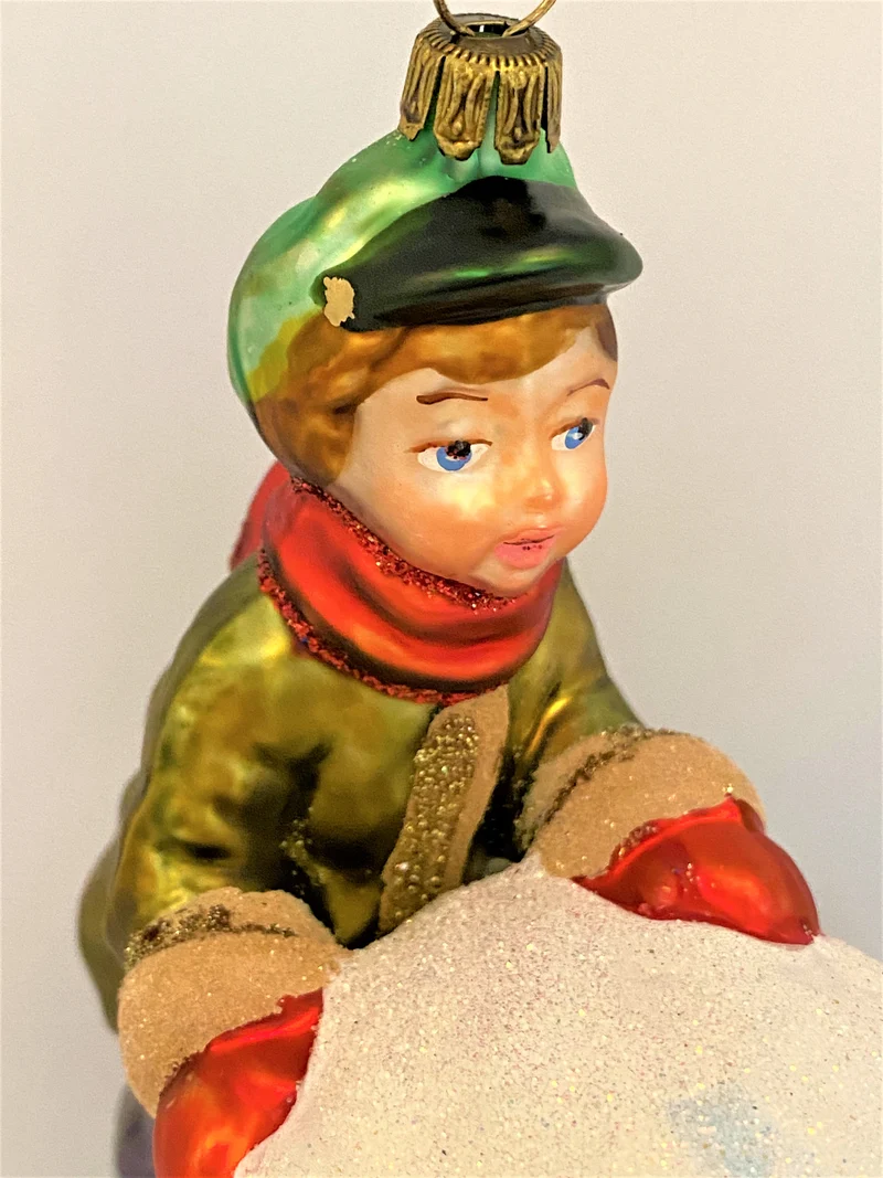 Der Junge will einen grossen Schneemann bauen , KOMOZJA MOSTOWSKI