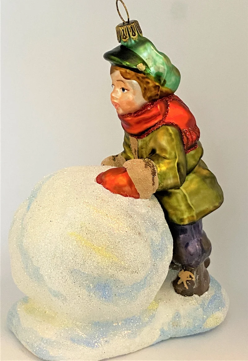 Der Junge will einen grossen Schneemann bauen , KOMOZJA MOSTOWSKI