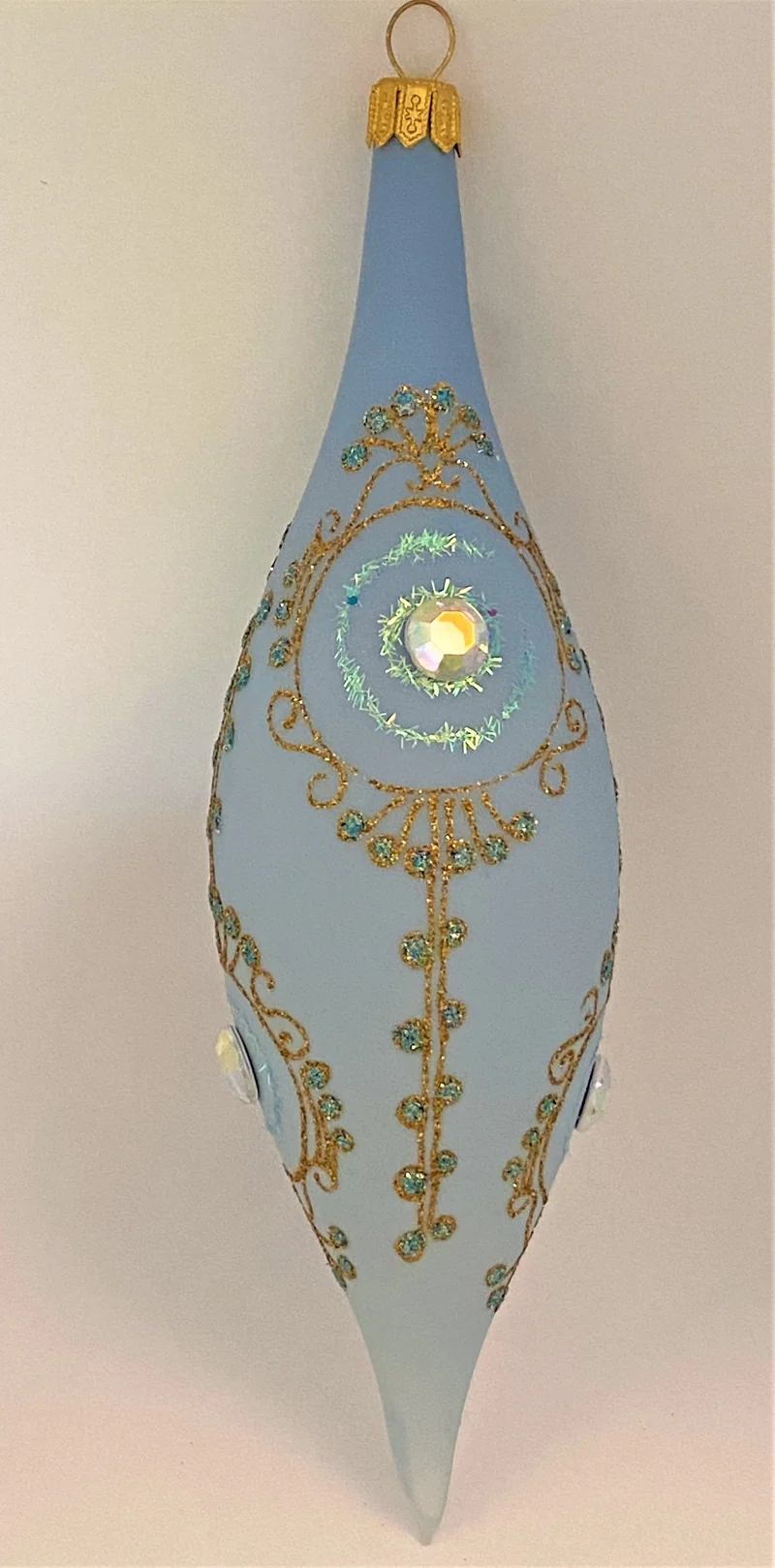 Zapfenform hellblau mit Gold-Dekor und Schmucksteinen
