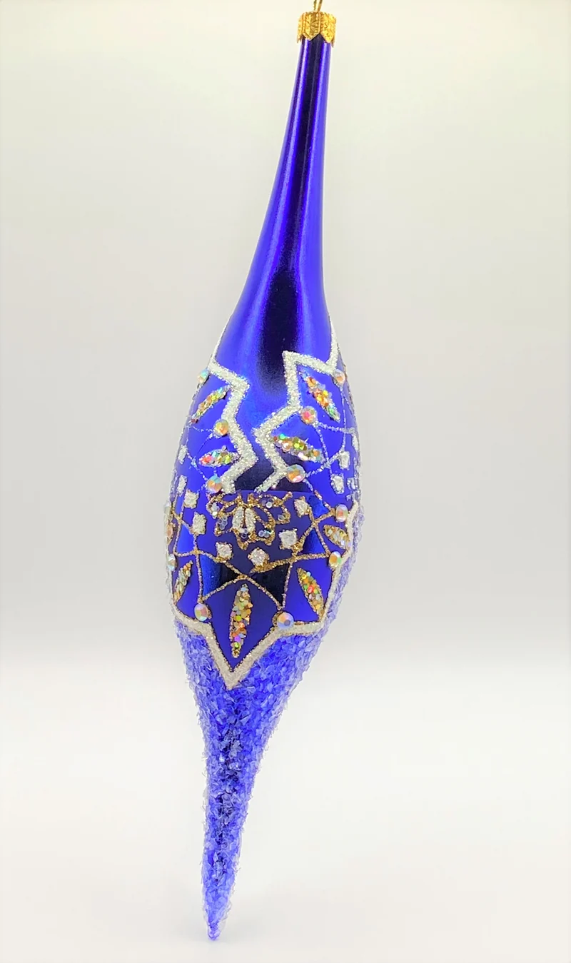 Blaue lange Olive weissem Dekor und Glitzersteinchen