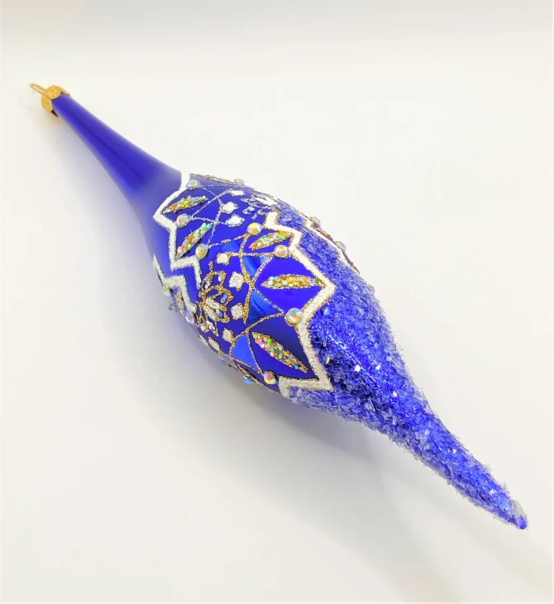 Blaue lange Olive weissem Dekor und Glitzersteinchen
