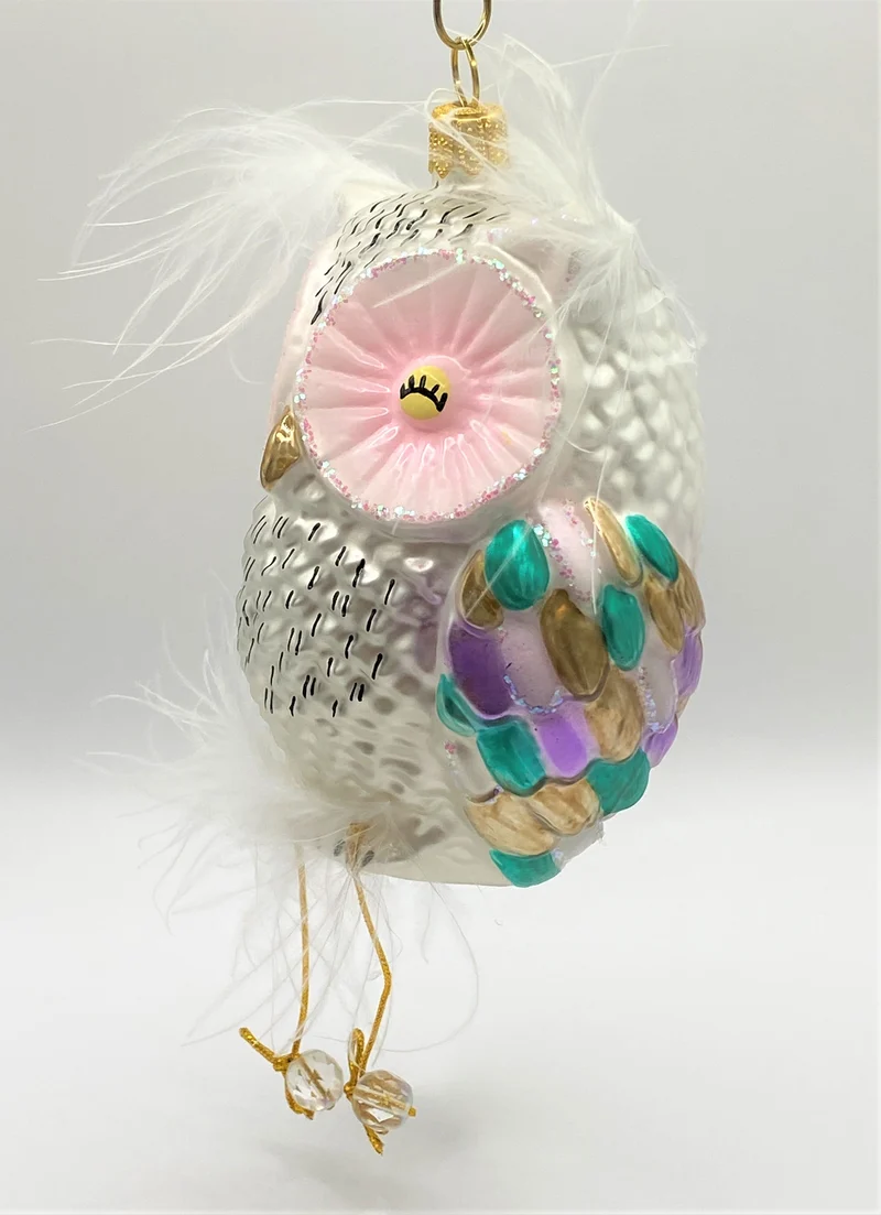 Dicke bunte Eule mit Bommelbeinchen
