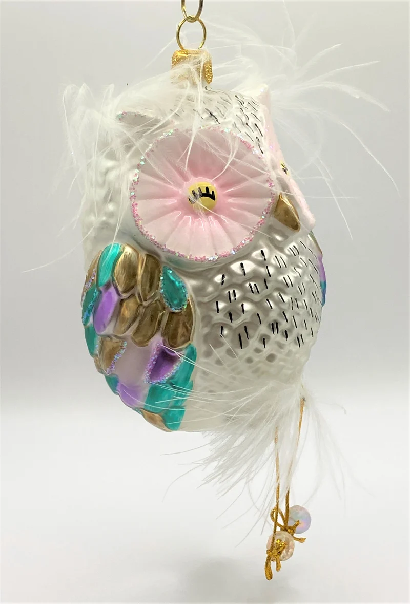 Dicke bunte Eule mit Bommelbeinchen