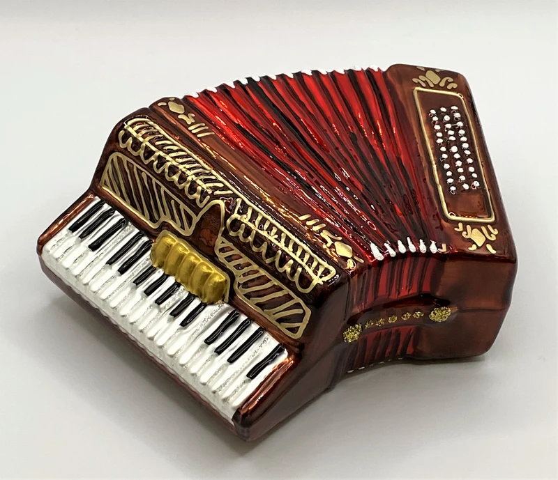 Grosse Handorgel mit rotem Balg, Akkordeon