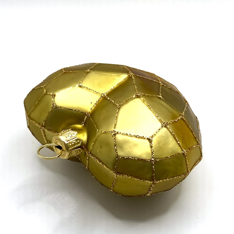 Goldenes Herz mit geometrischem Muster