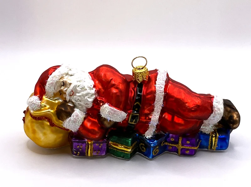 Weihnachtsmann macht ein Schläfchen