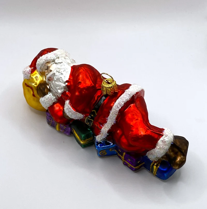 Weihnachtsmann macht ein Schläfchen