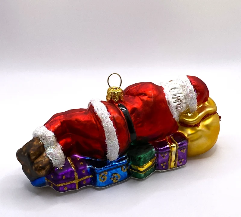 Weihnachtsmann macht ein Schläfchen