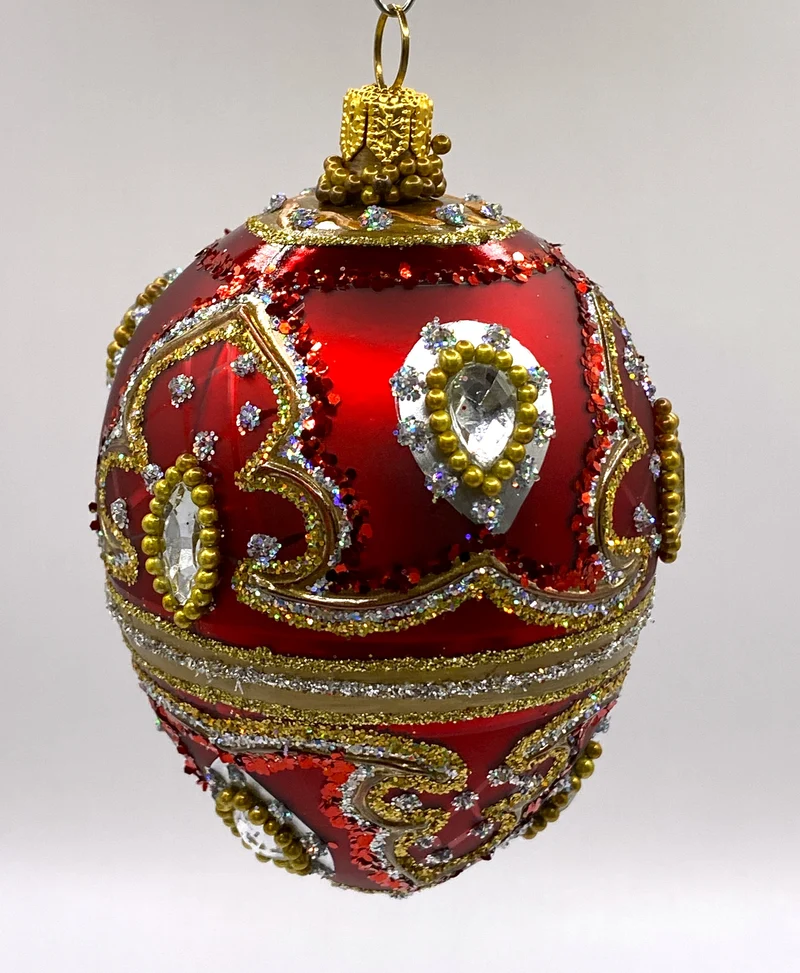 Faberge-Ei warmes Rot mit Barock Muster, silberne Steine