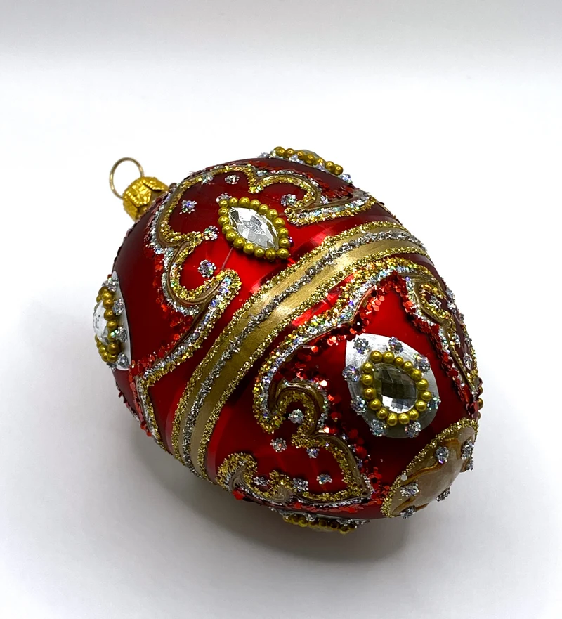 Faberge-Ei warmes Rot mit Barock Muster, silberne Steine