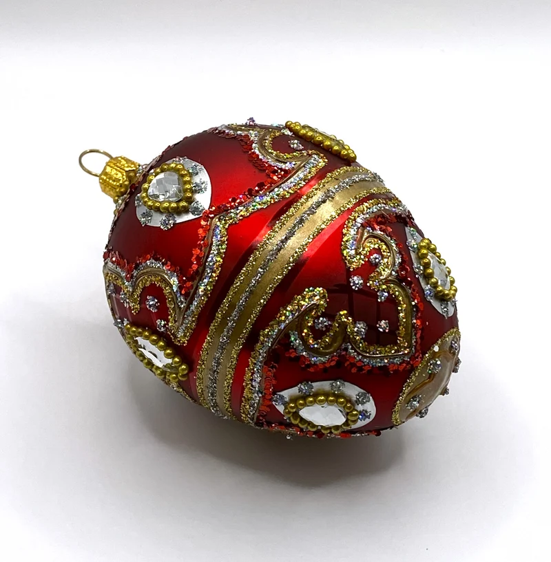 Faberge-Ei warmes Rot mit Barock Muster, silberne Steine