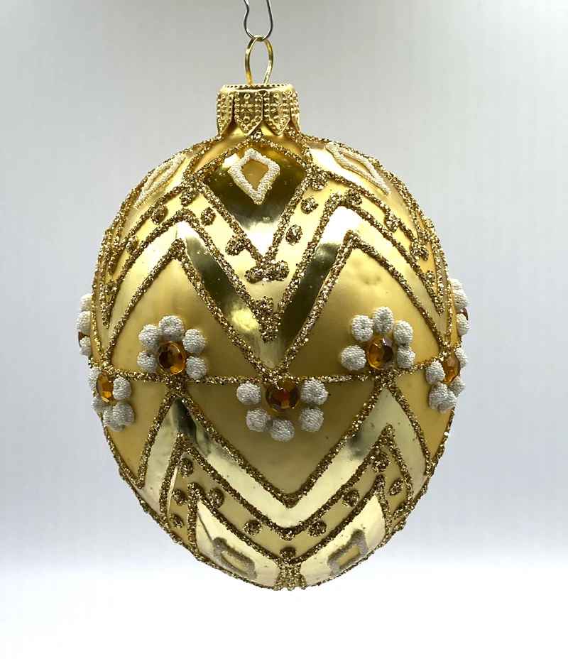 Ei-Form gold mit Zackendekor