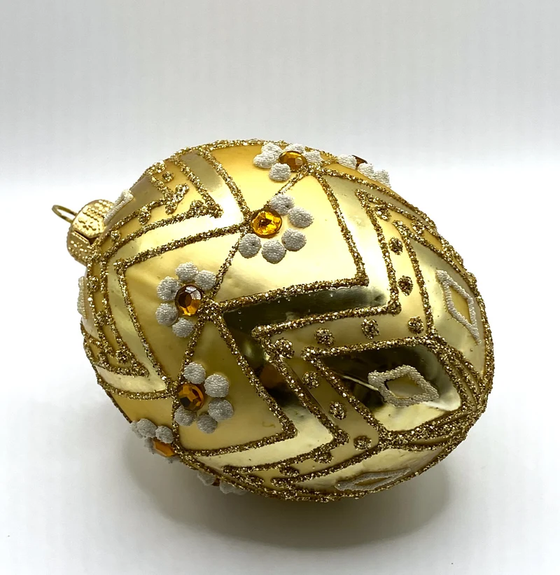 Ei-Form gold mit Zackendekor
