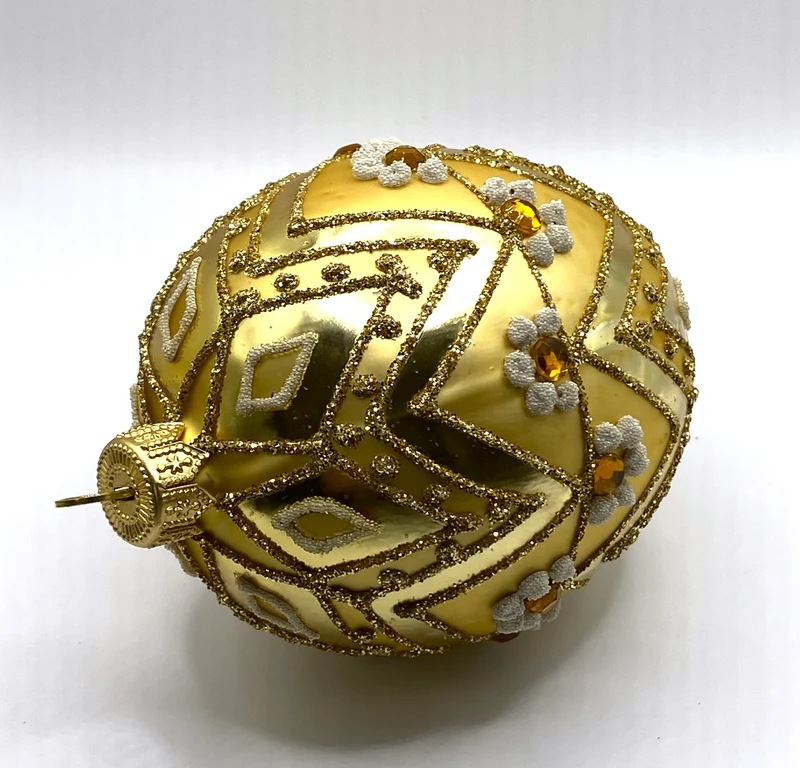 Ei-Form gold mit Zackendekor