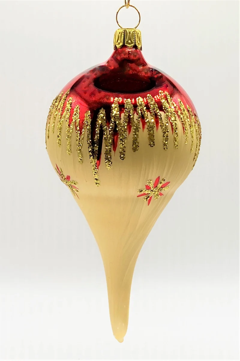 Langer Tropfen Rot und goldenem Eislack